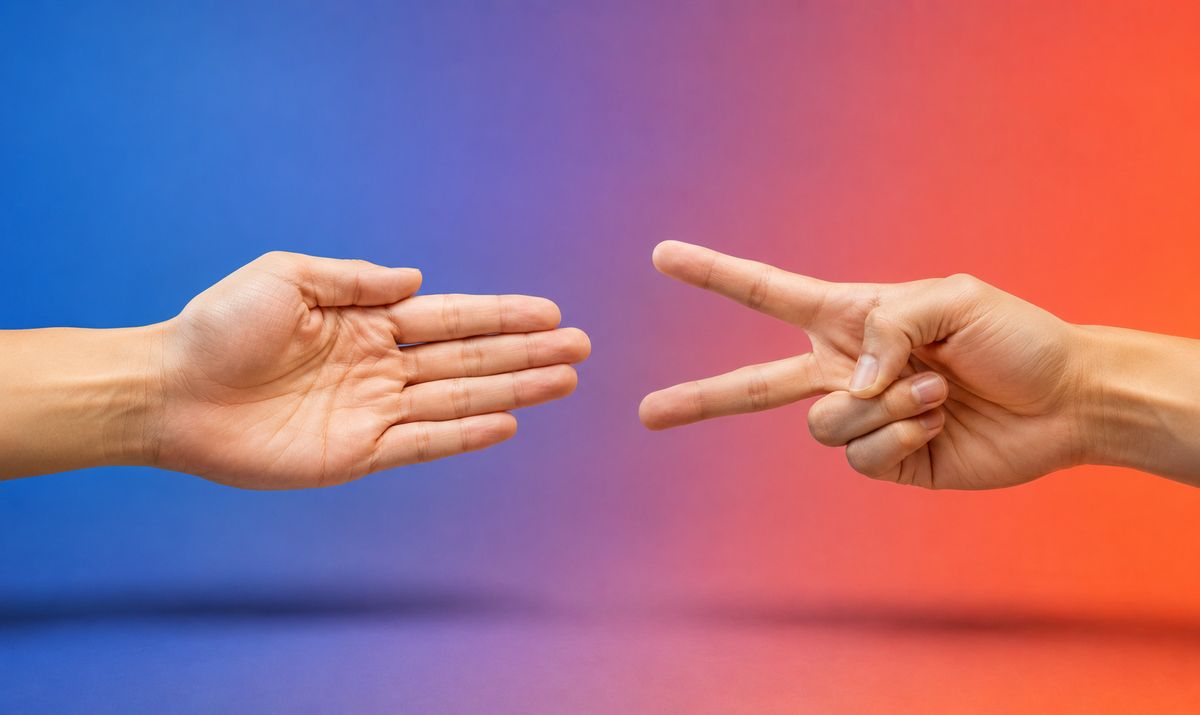 Two hands playing Rock Paper Scissors — paper versus scissors