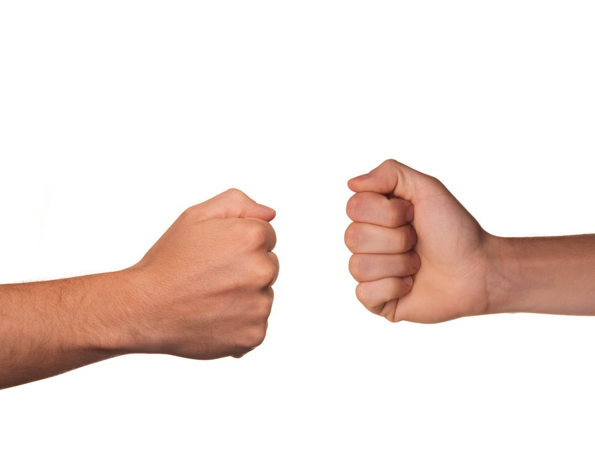 Two fists facing off — the classic Rock hand the five-hand game is built on